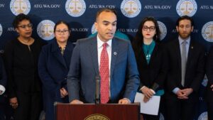 El procurador general del estado de Washington, Nick Brown, anunciando su primera demanda contra la administración Trump por la orden ejecutiva que pone fin a la ciudadanía por derecho de nacimiento. Oficina del procurador.