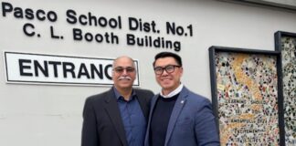 El superintendente adjunto de operaciones y apoyo del PSD, Raúl Sital, y el director de comercio, Joe Nguyễn - Departamento de comercio del estado de Washington