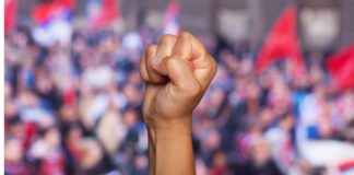 Movilizaciones por el Día Internacional de los Trabajadores en Seattle y Washington Puño