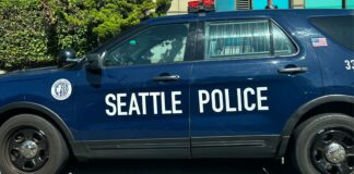 Tiroteo en Yesler Terrace: Se salvó de milagro luego que una bala le pasara rozando por la cabeza Patrulla del departamento de policía de Seattle