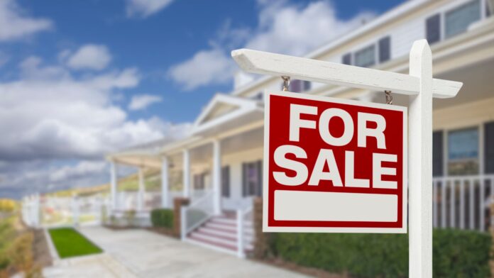 Home for Sale Real Estate Sign and House