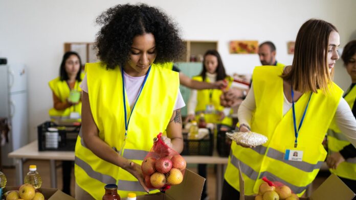 Altruist people working in a food bank Altruist people working in a food bank