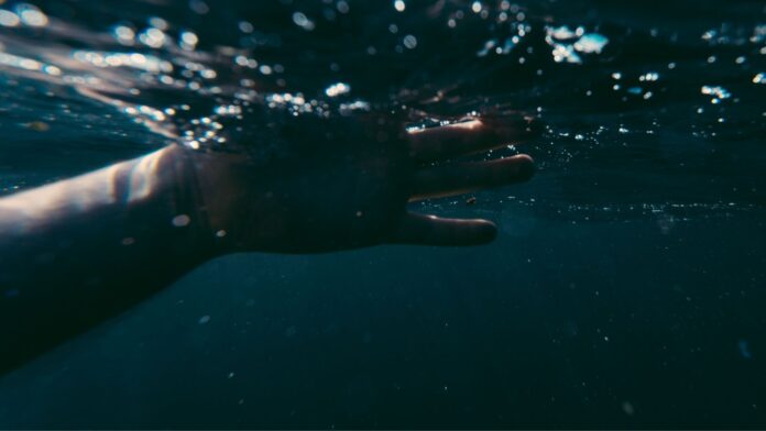 Hand in water