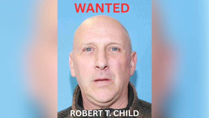 Robert T. Child Cartel de búsqueda difundido por autoridades con la fotografía de Robert T. Niño, hombre buscado en relación con una investigación de doble homicidio en el condado de Mason.