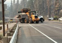SR 291 reabre tras más de una semana de cierres por los incendios de Spokane Maquinaria trabaja en la remoción de árboles peligrosos en la SR 291.