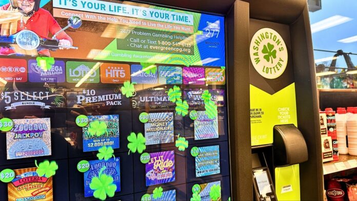 Máquina de venta de boletos de Washington’s Lottery con opciones de Lotto y otros juegos de lotería.