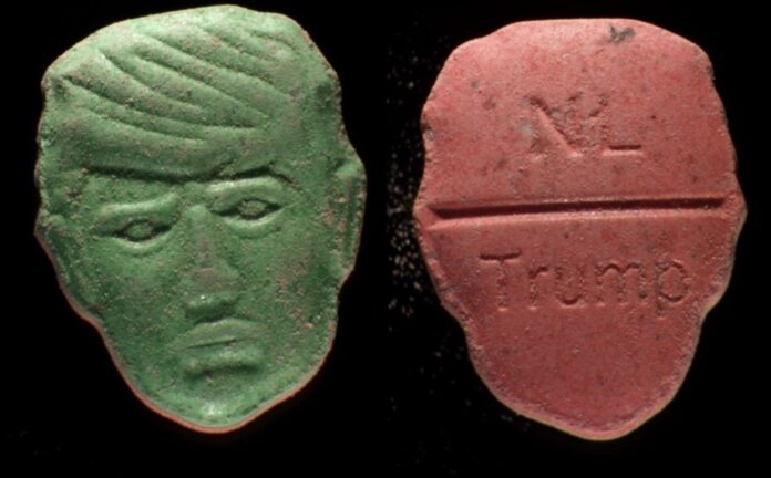 Droga con rostro de Trump Pastillas de distintos colores con el rostro de Donald Trump grabado en una cara y las inscripciones “NL” y “Trump” en el reverso.